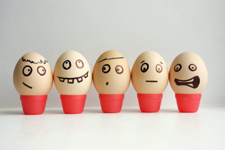 Eggs with painted face. Conceptの写真素材
