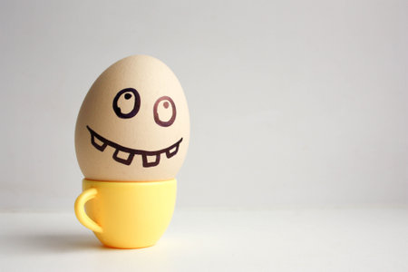 Eggs with painted face. Conceptの写真素材