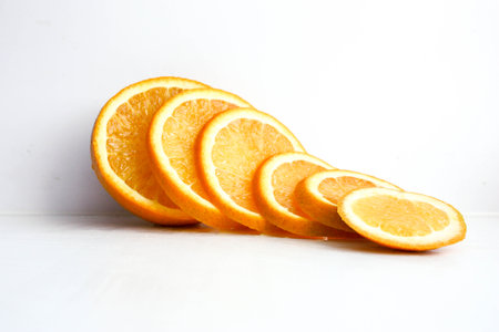 The orange is sliced. Photo for your designの写真素材