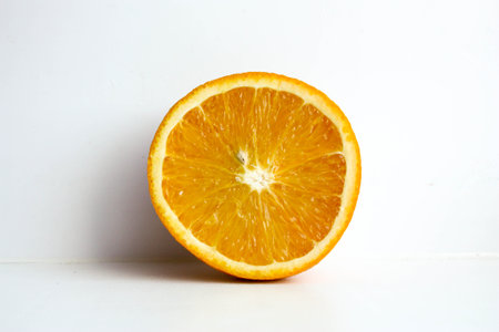 Orange sliced one slice. Photo for your designの写真素材