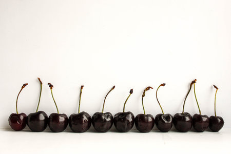Cherry dark stand near the wall in a row. on a white background. Photo for your designの写真素材