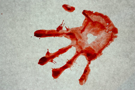 Bloody prints on a gray background. arm. Photo for your designの写真素材