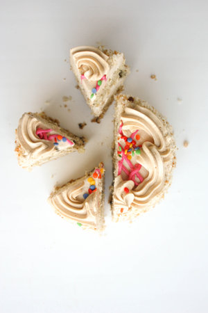 diet. Struggle for a healthy diet. The round cake is cut into pieces. Photo for your design. Vertical orientationの写真素材