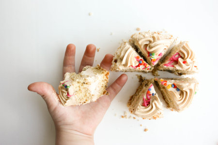 diet. Want a sweet at night. Struggle for health. Cake and hand rake a piece of cake. Photo for your...