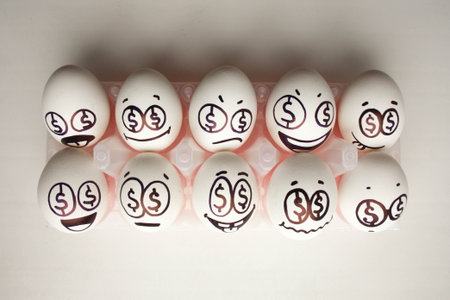 Concept of business training. Seminars and lectures. Eggs with painted face. Photo for your designの写真素材