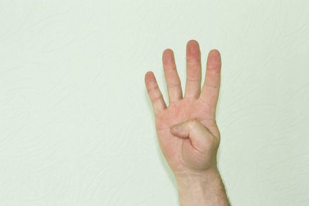 The hand of the male symbol is four digits. Photo for your design.