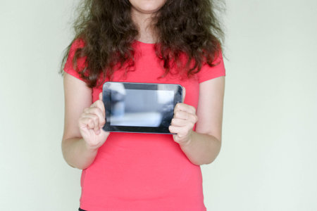 Sales and advertising concept. Place under inscription. Curly girl in red. Photo for your design....