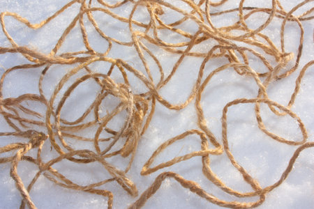rope with a spindle. photo for your design in the snow