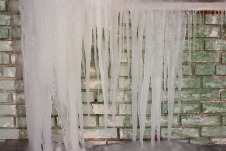 winter concept is harsh. icicles from water drops. huge very photo for your design. horizontal sheet orientationの写真素材