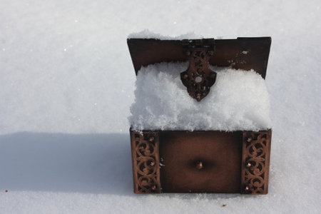 winter catalog cover. casket and snow. photo for your design.の写真素材