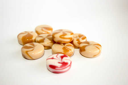 candy caramel. round. spiral to twist. photo for your design. dairy and strawberryの写真素材