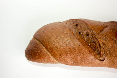 black bread delicious on a white background. photo for your design. fresh breadの写真素材