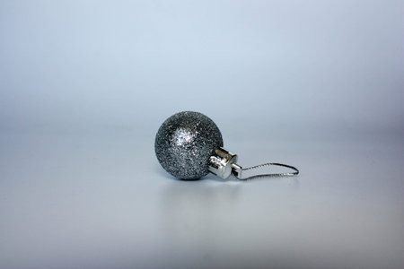 Christmas tree. decoration for spruce. silver ball in sequins. photo for your design.の写真素材
