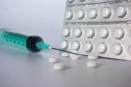 syringe with a needle for medical injection.