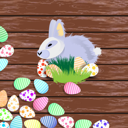 Easter. Easter rabbit with colored eggs in green peas. horizontal orientation of a leaf on a wooden backgroundのイラスト素材