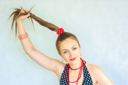 hair sturdy. healthy female hair. retro girlの写真素材