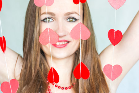 girl sexy retro with hearts. on a white background a charming womanの写真素材