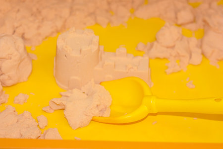 sand castle. entertainment for children. forma and scapula. yellow scapulaの写真素材