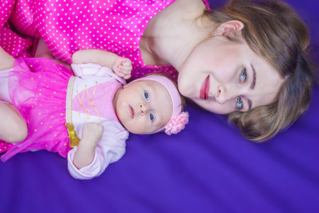 happy baby next to my mother. retro style. peasの写真素材