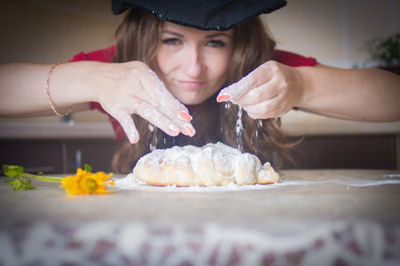 secret ingredient food. food for Halloween. Halloween party. The witch cooks food. baked a bun. sprinkles a particular ingredientの写真素材