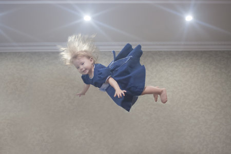 abduction of UFO. kidnapping. little girl and spaceship lights. fantasiesの写真素材