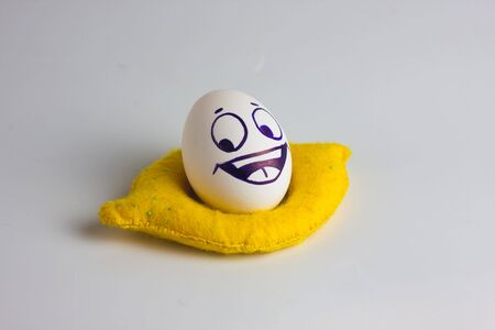 Eggs with funny and funny faces. funny eggs on a white backgroundの写真素材
