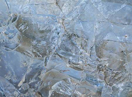 Splits in ice. Cool background. Ice cracks. Rock texture. Ice texture. Rough structure mineral....