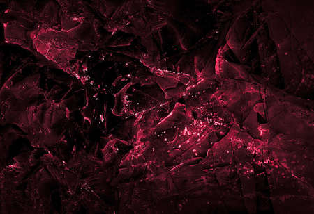Wall red abstraction. Dark Backgrounds. Lava frozen. Paint spots. Rock surface with cracks. Rock background. Abstract texture. Rock texture. Stone background. Stone texture. Structure.の写真素材