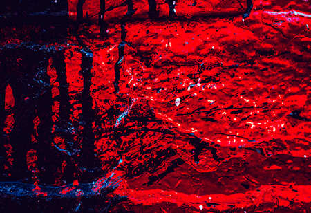 Wall red abstraction. Dark Backgrounds. Lava frozen. Paint spots. Rock surface with cracks. Rock background. Abstract texture. Rock texture. Stone background. Stone texture. Structure.の写真素材