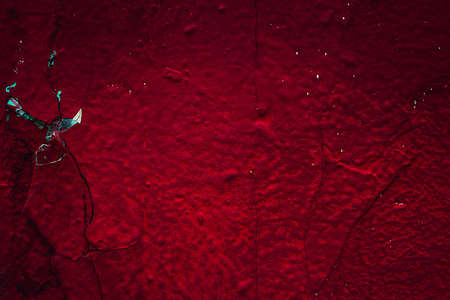 Wall red abstraction. Dark Backgrounds. Lava frozen. Paint spots. Rock surface with cracks. Rock background. Abstract texture. Rock texture. Stone background. Stone texture. Structure.の写真素材