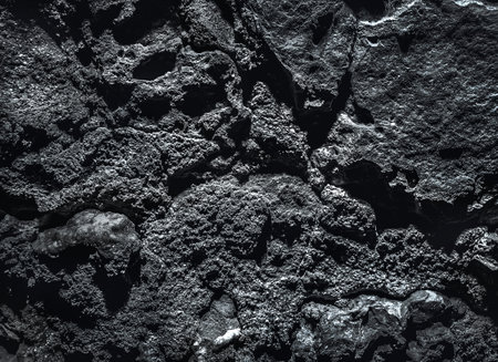 Silver Wall. Dark marble. Rock texture. Black texture. Stone background. Rock pile. Paint spots. Rock surface with cracks. Grunge Rough structure. Abstract texture.の写真素材