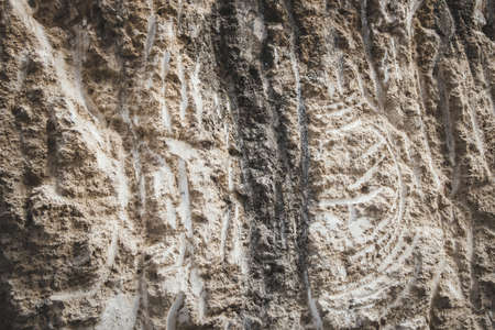 Silver Wall. Dark marble. Rock texture. Black texture. Stone background. Rock pile. Paint spots. Rock surface with cracks. Grunge Rough structure. Abstract texture.の写真素材