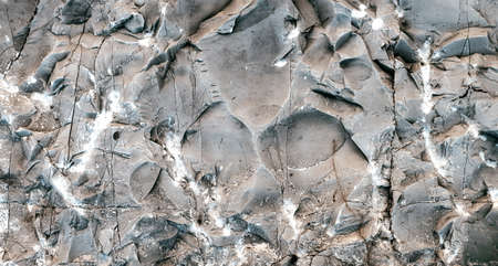 Silver Wall. Dark marble. Rock texture. Black texture. Stone background. Rock pile. Paint spots....