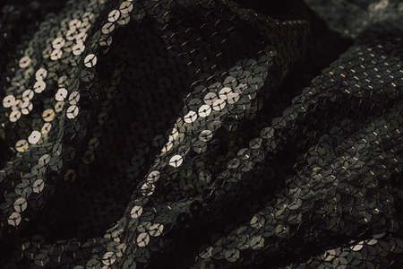 Glitter background. Fabric texture with spangles. Background sequin. Glitter texture. Fabric...