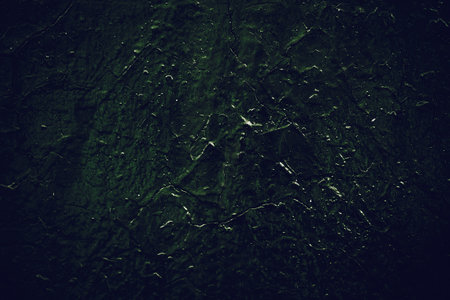 Black texture. Stone background. Dark marble. Rock texture. Rock surface with cracks. Rock pile. Paint spots wall. Grunge Rough structure. Abstract texture.の写真素材