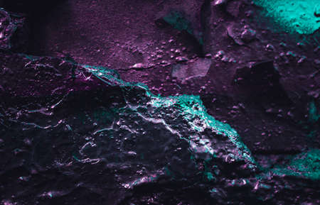 Rock holography. Holographic neon colors. Texture marble pattern. Abstract background. Lava. Rock texture. Stone background. Rock background. Rough structure. Wallpaper abstraction. Cracks wallの写真素材