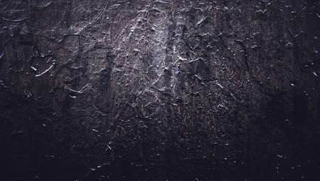 Black texture. Stone background. Dark marble. Rock texture. Rock surface with cracks. Rock pile....