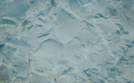 Splits in ice. Cool background. Ice cracks. Rock texture. Ice texture. Rough structure mineral....