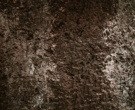 Brown texture. Stone background. Rock texture. Grunge Rough structure. Abstract texture. Rock surface with cracks. Rock pile. Paint spots wall. Wall marble.の写真素材