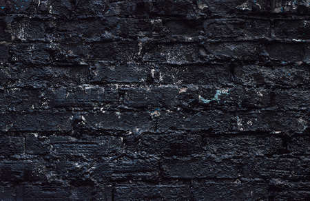 Black texture. Stone background. Dark marble. Rock texture. Rock surface with cracks. Rock pile. Paint spots wall. Grunge Rough structure. Abstract texture.の写真素材