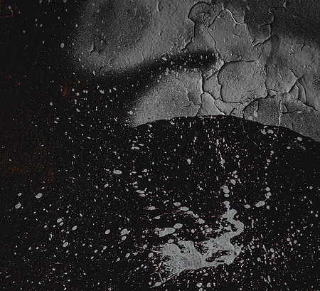 Black texture. Stone background. Dark marble. Rock texture. Rock surface with cracks. Rock pile....