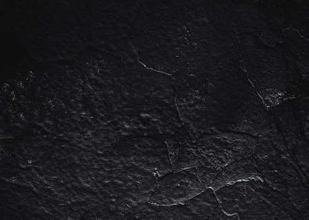 Black texture. Stone background. Dark marble. Rock texture. Rock surface with cracks. Rock pile. Paint spots wall. Grunge Rough structure. Abstract texture.の写真素材