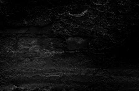 Black texture. Stone background. Dark marble. Rock texture. Rock surface with cracks. Rock pile. Paint spots wall. Grunge Rough structure. Abstract texture.の写真素材