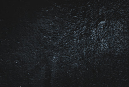 Black texture. Stone background. Dark marble. Rock texture. Rock surface with cracks. Rock pile. Paint spots wall. Grunge Rough structure. Abstract texture.の写真素材