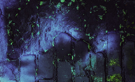 Rock texture. Dark stone wall. Stone background. Rock surface with holography, nacre. Wall...
