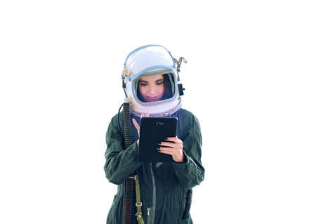 Astronaut girl in space helmet. Isolated on white background. Young girl in an astronaut suit. Space...