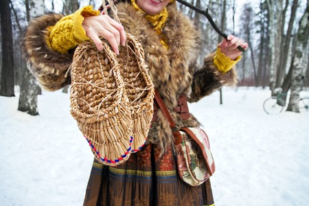 Bast shoes are handmade in the hand of a womanの写真素材