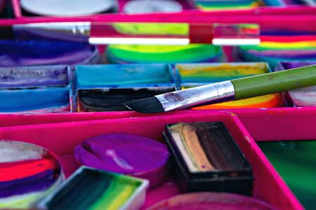 brush for face painting, purple green, pink, blue paint colorの写真素材