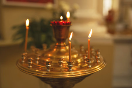 lit candles in church