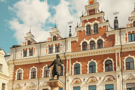 Town Hall in Vyborg with a monument to founder of Vyborg Castle, Torgils Knutssonの写真素材